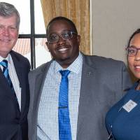 President Haas with two guests at the Sarasota event.